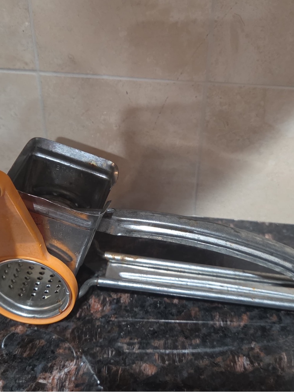 Vintage Handheld Food Press - Orange Accent